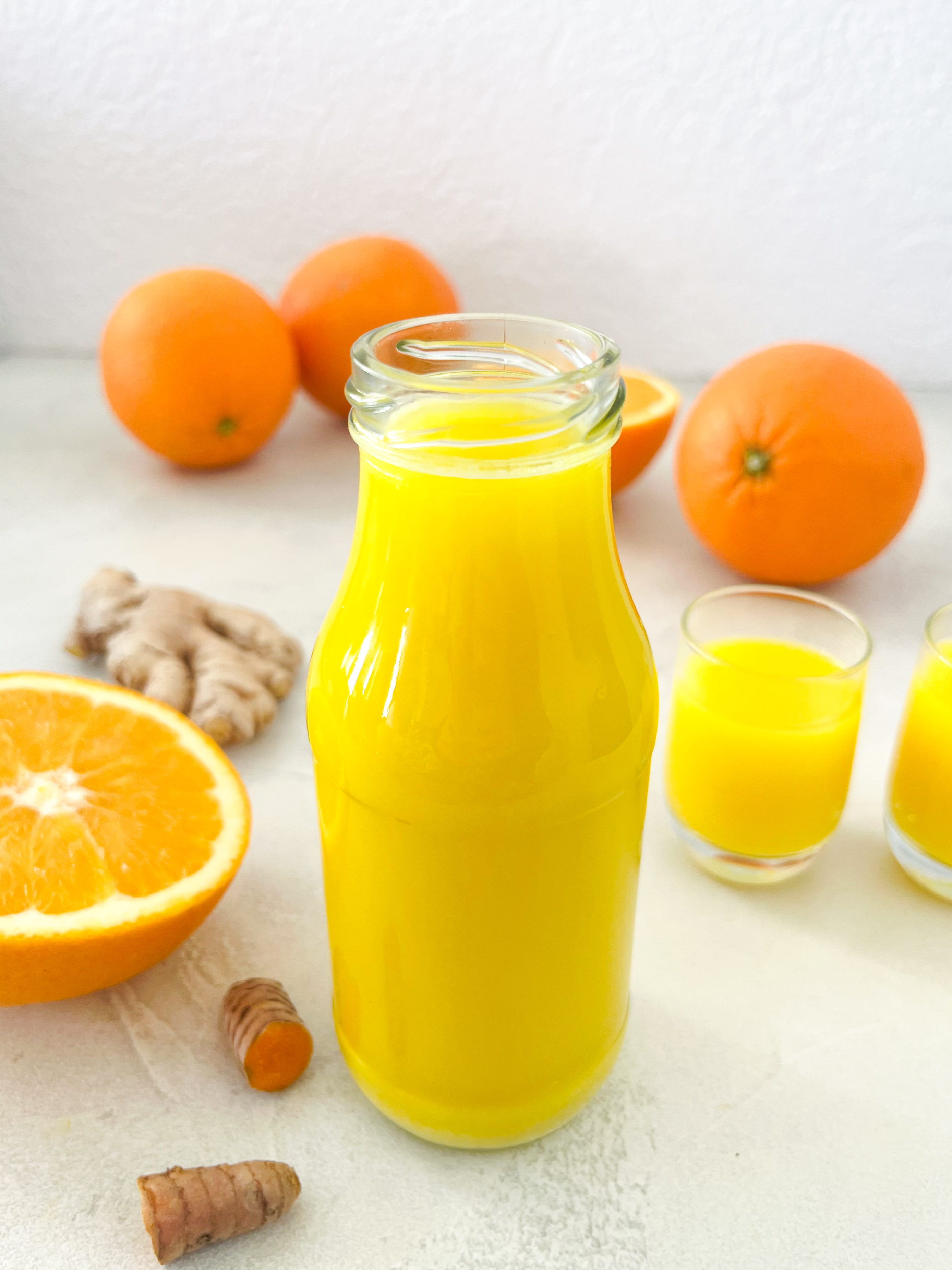 Immun-Booster: Ingwer-Kurkuma Shot mit Orangensaft selber machen